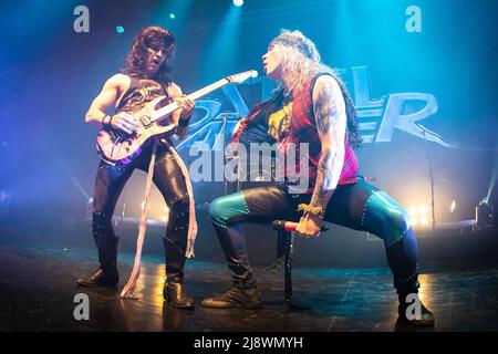Michael Starr e Satchel of Steel Panther si esibiscono dal vivo Foto Stock