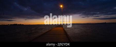 Tramonto drammatico ,Como Jetty, Westeern Australia, Foto Stock