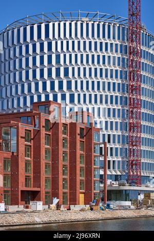 Costruzione dell'edificio circolare degli uffici 'Spidsen' a Nordø/Redmolen, Copenaghen, Danimarca Foto Stock