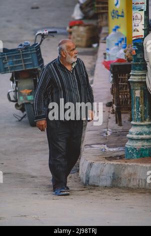 La gente egiziana locale nell'Oasi egiziana di Siwa Foto Stock