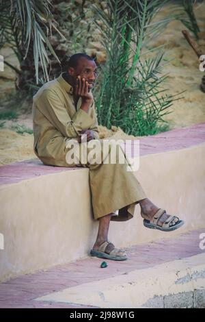 La gente egiziana locale nell'Oasi egiziana di Siwa Foto Stock