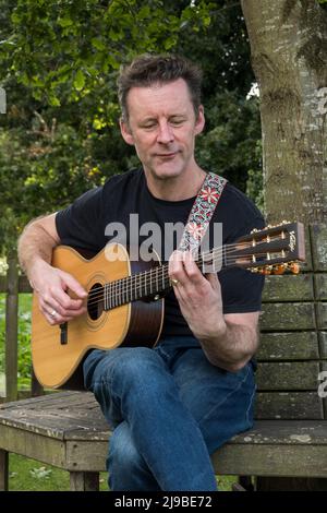 Cantante e cantautore folk irlandese Gus Glynn Foto Stock