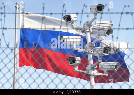 Bandiera della Russia dietro recinzione filo spinato e telecamere cctv. Concetto di sanzioni, dittatura, discriminazione e violazione dei diritti umani e della libertà Foto Stock