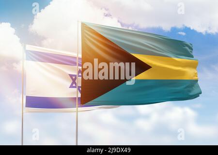 Cielo azzurro soleggiato e bandiere delle bahamas e di israele Foto Stock