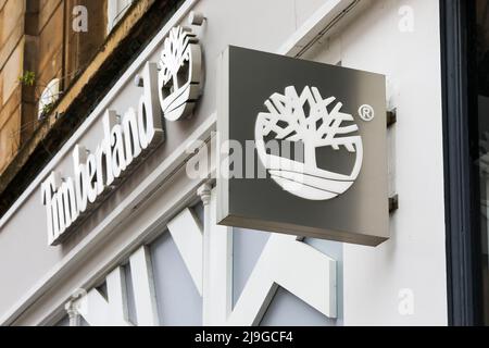 Timberland Copyright segno sopra un negozio di abbigliamento di moda entrata Foto Stock