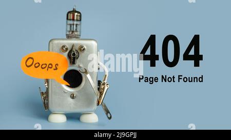 Funny 404 pagina. Un vecchio robot lampada riparatore. Foto Stock