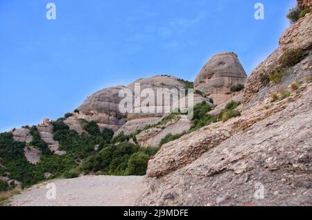 MONTSERRAT, BARCELLONA, SPAGNA Abbazia di Santa Maria de Montserrat a Monistrol . Foto Stock