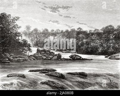 Una cascata nel fiume Maroni, Guyana Francese, Dipartimento di Francia, Sud America. Viaggio di esplorazione all'interno delle Guianas 1877 di Jules Crevaux. Le Tour du Monde 1879 Foto Stock