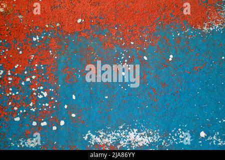 Vernice arancione e turchese affredita astratto con trucioli bianchi Foto Stock