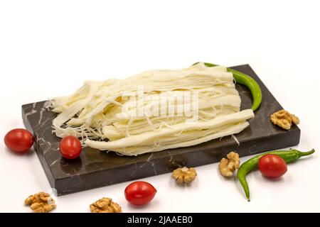 Formaggio a cordoncino. Delizioso formaggio a base di latte fresco di vacca. Nome locale tel peyniri. Primo piano Foto Stock