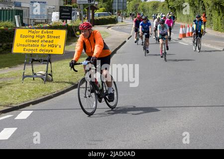 Partecipanti concorrenti Charity Cycling Event RideLondon Fyfield Essex Foto Stock