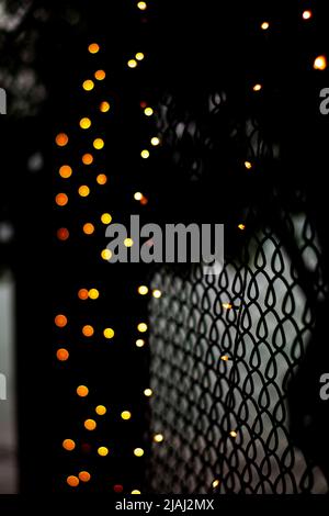 Bokeh leggero alla recinzione Foto Stock