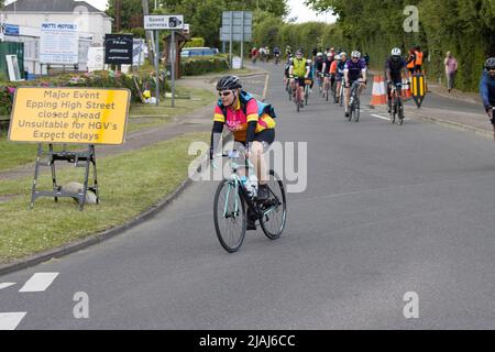 Partecipanti concorrenti RideLondon Charity Cycling Event Fyfield Essex Foto Stock