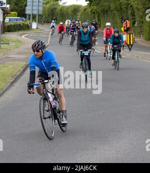 Partecipanti concorrenti RideLondon Charity Cycling Event Fyfield Essex Foto Stock