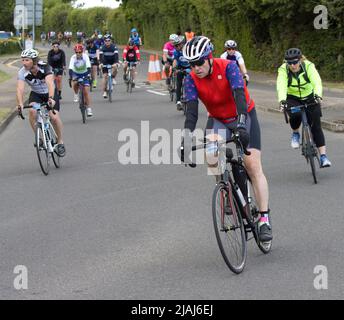 Partecipanti concorrenti RideLondon Charity Cycling Event Fyfield Essex Foto Stock