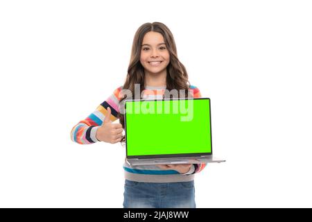 guarda qui. presentazione della scuola sul computer. bambino pronto per la video lezione. ragazza teen con laptop. Foto Stock