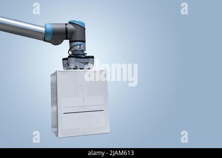 Braccio robot con scatole su sfondo grigio. Concetto Smart Industry 4,0 Foto Stock