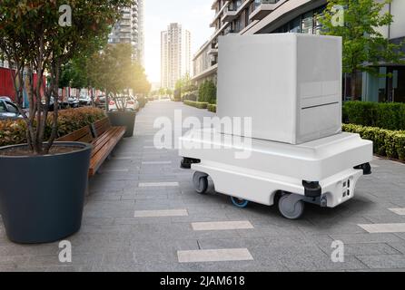 Robot di consegna che trasporta una scatola sulla strada. Concetto Foto Stock