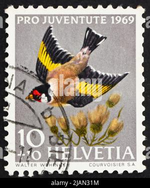 SVIZZERA - CIRCA 1969: Un francobollo stampato in Svizzera mostra European Goldfinch, Carduelis Carduelis, uccello, circa 1969 Foto Stock
