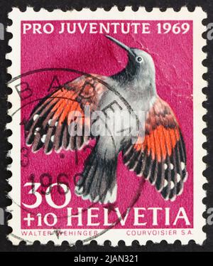 SVIZZERA - CIRCA 1969: Un francobollo stampato in Svizzera mostra Wall Creeper, Tichodroma Muraria, uccello, circa 1969 Foto Stock