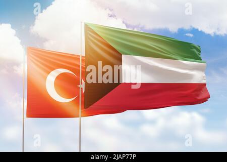 Cielo azzurro soleggiato e bandiere di kuwait e turchia Foto Stock