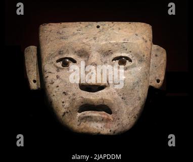 Maschera Aztec Jade. Templo Mayor Museum presso il sito del Grande Tempio Azteco, Città del Messico. Foto Stock