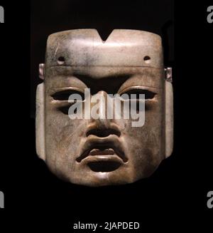 Olmec Mask dall'offerta 20. Templo Mayor Museum presso il sito del Grande Tempio Azteco, Città del Messico. Foto Stock