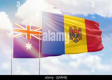 Cielo azzurro soleggiato e bandiere di moldavia e australia Foto Stock