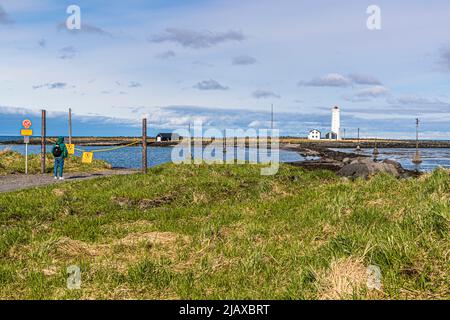 Faro dell'isola di Grótta a Seltjarnarnesbær, Islanda Foto Stock