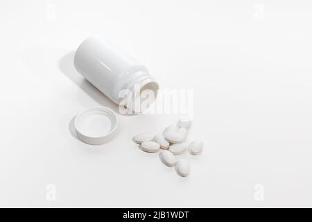 capsule farmaceutiche bianche assortite, pillole, compresse e farmaci Foto Stock