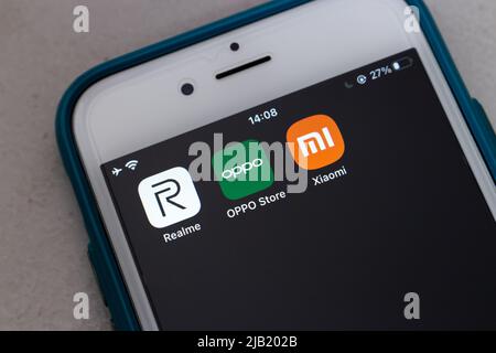 Popolare marchio cinese di smartphone Realme (filiale di BBK Electronics), Oppo (Guangdong Oppo Mobile Telecommunications Corp., Ltd) e Xiaomi icone. Foto Stock