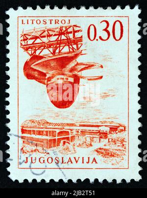 JUGOSLAVIA - CIRCA 1966: Un francobollo stampato in Jugoslavia dal numero 'Engineering & Architecture' mostra la cantieristica, circa 1966. Foto Stock