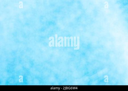 Il bokeh blu e bianco illumina l'immagine. Cerchi scintillanti sfondo astratto, sfondo sfocato Foto Stock