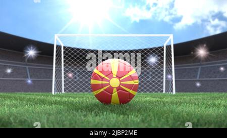 Pallone da calcio con bandiere colorate su uno sfondo luminoso e soleggiato dello stadio. Macedonia del Nord. Immagine 3D Foto Stock