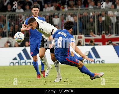 Monaco di Baviera, Germania. 07th giugno 2022. 7th giugno 2022, Allianz Arena, Monaco, UEFA Nations League Germania vs Inghilterra, nella foto Declan Rice (Inghilterra), Kai Havertz (Germania), Harry Maguire (Inghilterra) credito: dpa/Alamy Live News Foto Stock