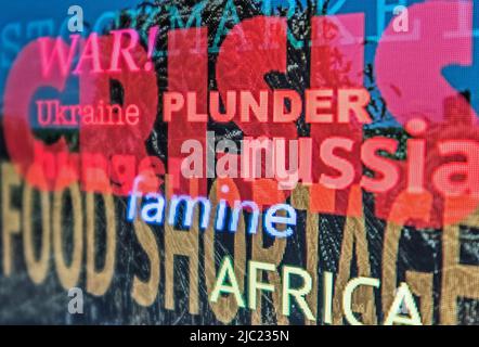 Un'immagine creativa che raccoglie alcune parole relative alla crisi alimentare umanitaria causata dalla guerra in Ucraina, screenshot. Foto Stock