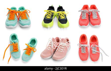 Set di scarpe sportive moderne isolate su bianco Foto Stock
