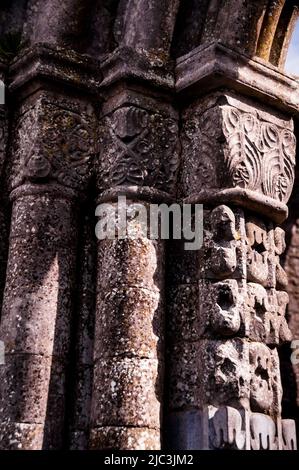 Pietra scolpita di archi romanici alle rovine di Cong Abby a Cong, Irlanda. Foto Stock