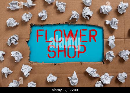 Cartello con la scritta Flower Shop. Parola scritta su dove fiori recisi sono venduti con decorazioni per regali -48057 Foto Stock