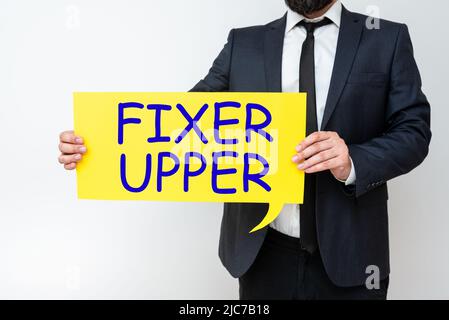 Inspirazione che mostra il segno fissaggio superiore. Internet Concept casa in bisogno di riparazioni utilizzato principalmente connessione con l'acquisto -48157 Foto Stock