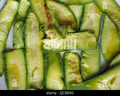 zucchine aka zucchine verdure vegetariane cibo utile come sfondo Foto Stock