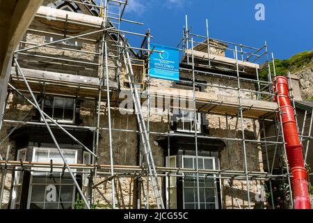 Llandudno. Ponteggi . Manutenzione e riparazione di case in muratura Foto Stock