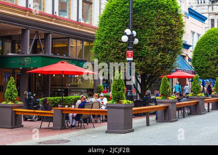 Scena stradale lungo Government Street a Victoria British Columbia Canada Foto Stock