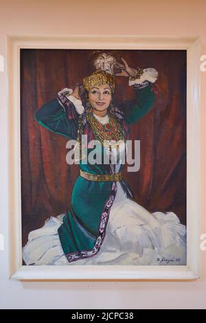 Un dipinto, ritratto di lei. Al museo della casa di ballerino del patrimonio armeno, attrice, cantante Tamar Khanum. A Tashkent, Uzbekistan. Foto Stock