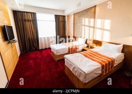 Camera Standard con letti gemelli in hotel Foto Stock