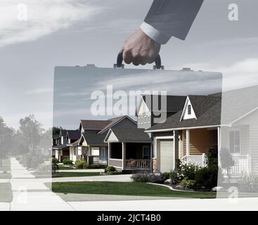 Realtor con valigetta su case suburbane Foto Stock