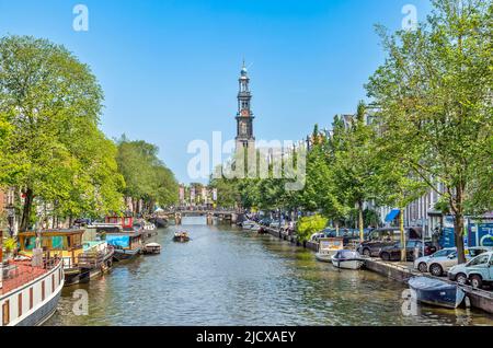 Chiesa di Westerkerk sul canale Prinsengracht, Amsterdam, Olanda del Nord, Paesi Bassi, Europa Foto Stock