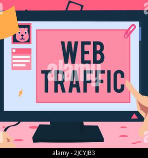 Segnale di testo che mostra il traffico Web. Internet Concept quantità di dati inviati e ricevuti dai visitatori di una mano di sito web toccando Desktop Inside Web browser Foto Stock