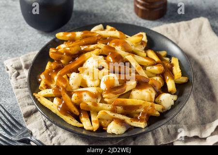 Fritture alla francese di formaggio con sugo di carne e formaggi fatti in casa Foto Stock