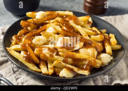 Fritture alla francese di formaggio con sugo di carne e formaggi fatti in casa Foto Stock